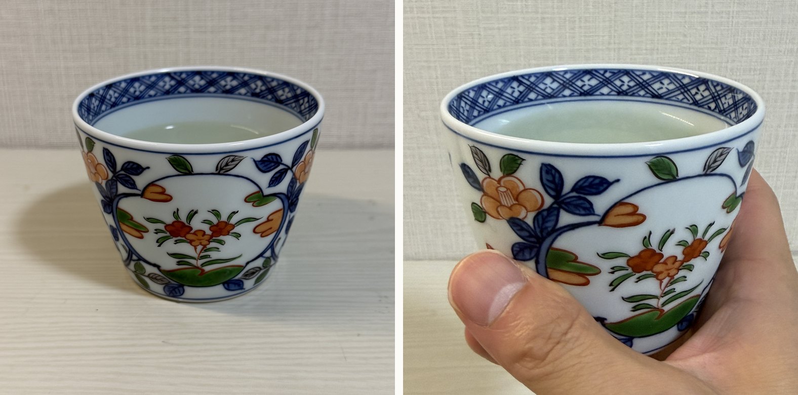 Sake served in a Gen-emon Kiln soba choko, and a hand holding the cup filled with sake